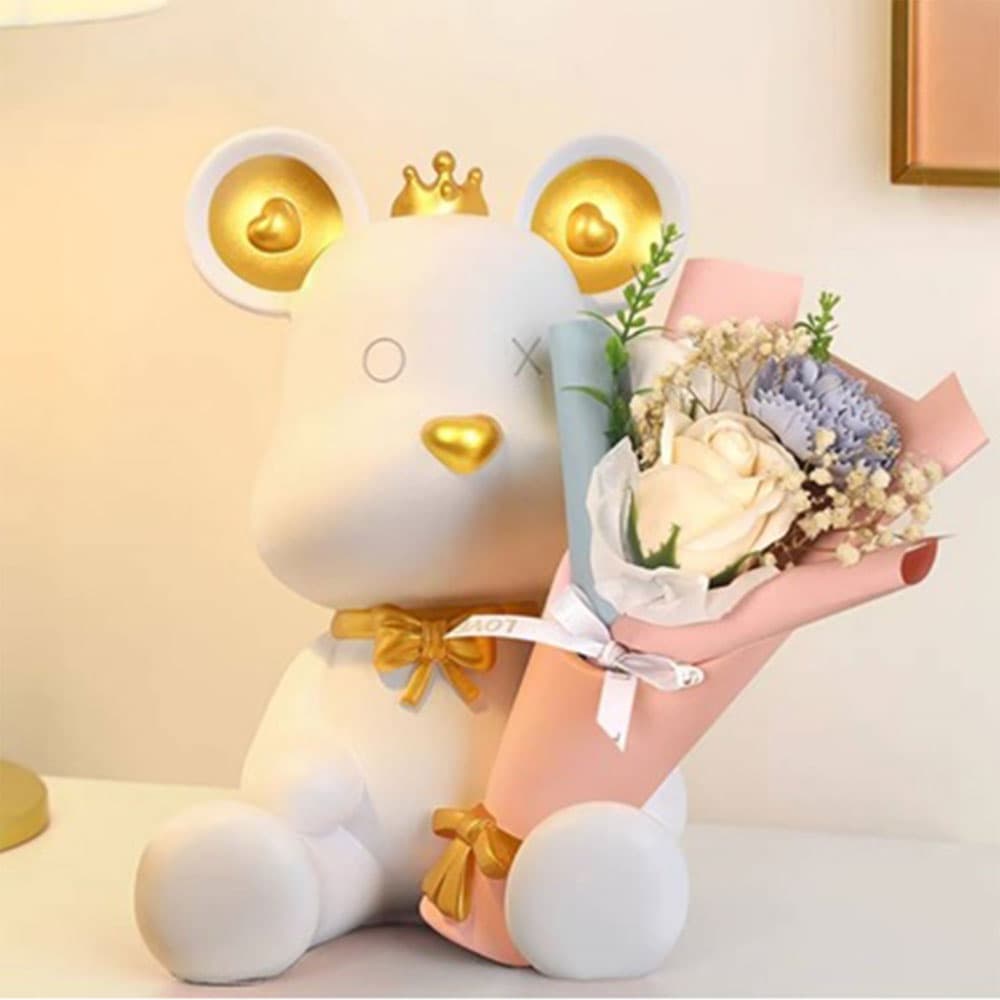 BEAR (W) HOLDING A VASE